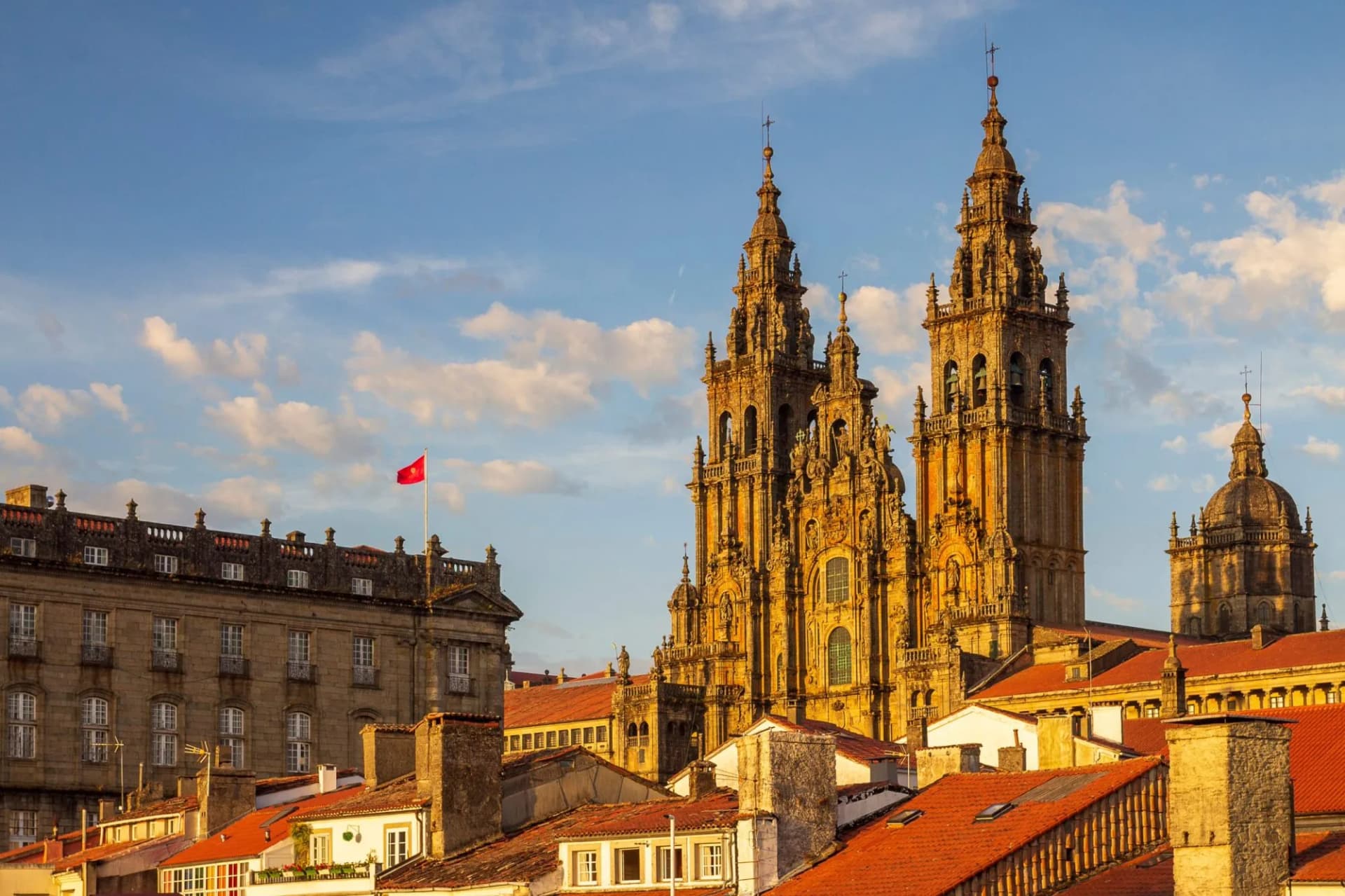 Santiago de Compostela Cathedral Towers Close Up with Sun Light Hitting the facade and Tiled Roofs La Coruña Galicia