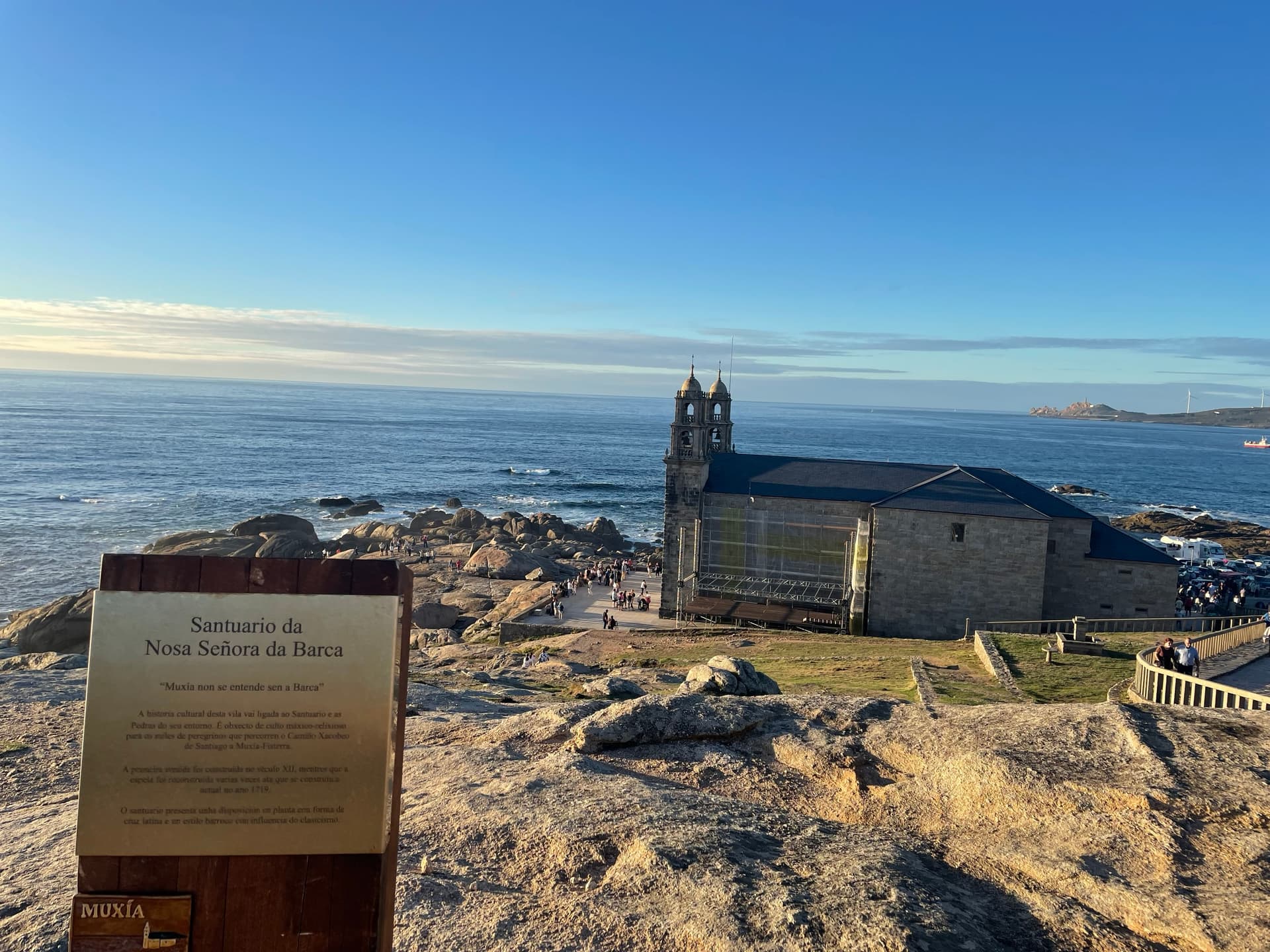 Santuario da Nosa Señora da Barca stone church on rocky coast in Muxia overlooking the sea
