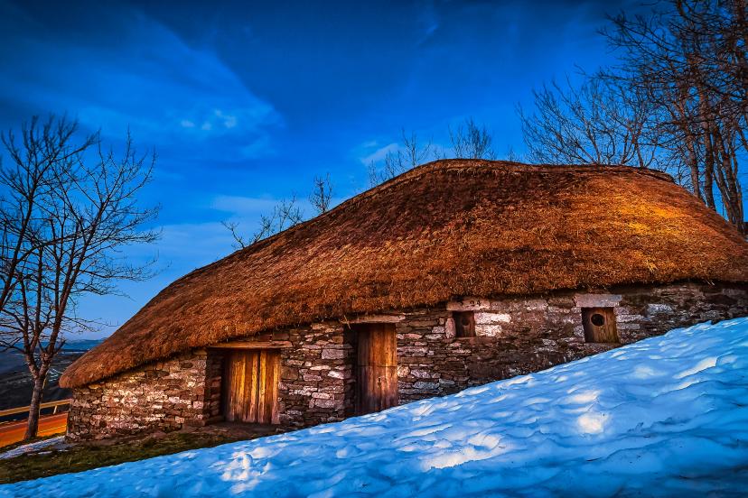 Traditional Celtic Thatched Roof Payoza House in the Town of O Cebreiro, Spain, along the Way of St James Pilgrimage Trail Camino de Santiago