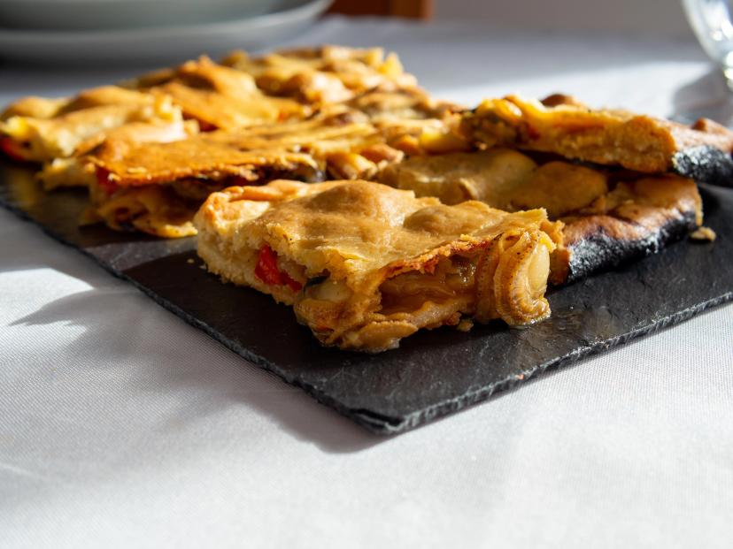 Variegated scallop pie. Traditional Galician food. Empanada de Zamburiñas