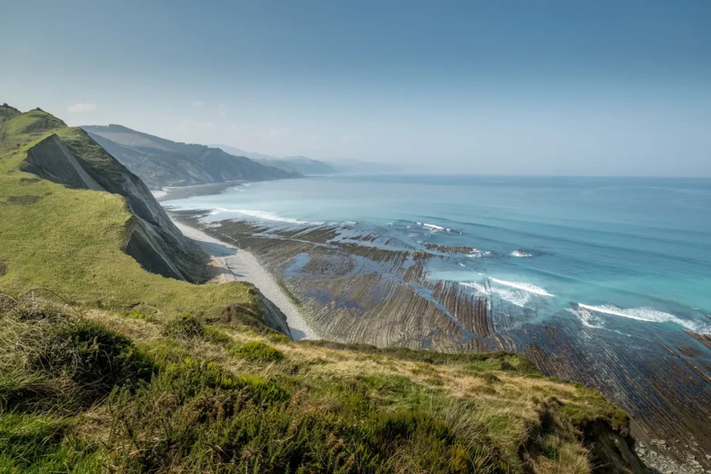 Hiking on the coast between Zumaia and Deba on the Camino del Norte, Basque Country