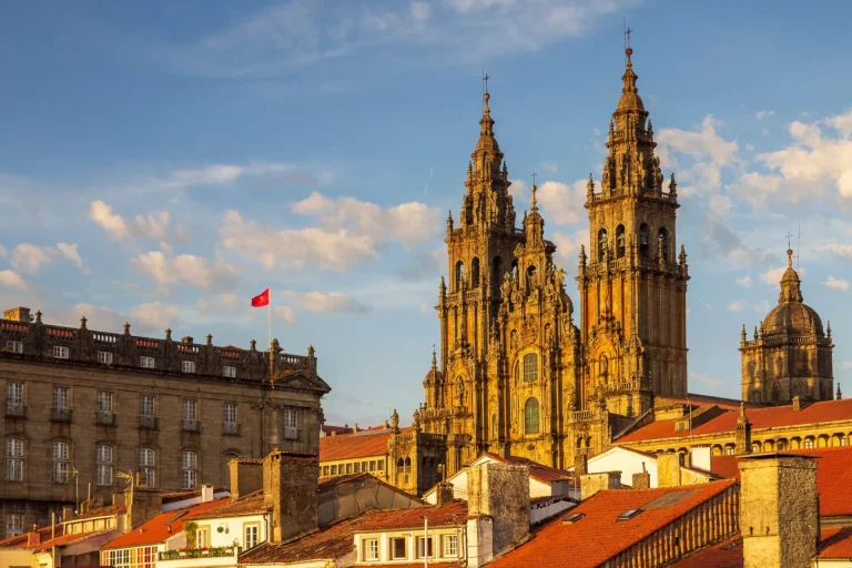 Santiago de Compostela Cathedral Towers Close Up with Sun Light Hitting the facade and Tiled Roofs La Coruña Galicia